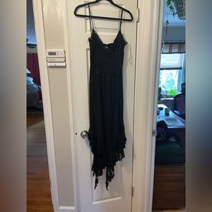 Black dress.  Beautiful piece.  Never worn